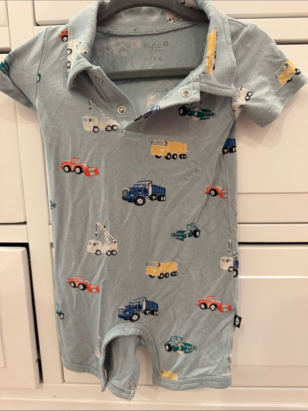 Kyte BABY Light Blue Construction Vehicles Short Sleeve One-Piece